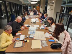 Volunteers wrap books for Appalachian Prison Book Project